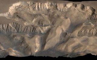 <h1>PIA00005:  Oblique View of Valles Marineris</h1><div class="PIA00005" lang="en" style="width:800px;text-align:left;margin:auto;background-color:#000;padding:10px;max-height:150px;overflow:auto;">An oblique, color image of central Valles Marineris, Mars showing relief of Ophir and Candor Chasmata; view toward north. The photograph is a composite of Viking high-resolution images in black and white and low-resolution images in color. Ophir Chasma on the north is approximately 300 km across and as deep as 10 km. The connected chasma or valleys of Valles Marineris may have formed from a combination of erosional collapse and structural activity. Tongues of interior layered deposits on the floor of the chasmata can be observed as well as young landslide material along the base of Ophir Chasma's north wall.<br /><br /><a href="http://photojournal.jpl.nasa.gov/catalog/PIA00005" onclick="window.open(this.href); return false;" title="Voir l'image 	 PIA00005:  Oblique View of Valles Marineris	  sur le site de la NASA">Voir l'image 	 PIA00005:  Oblique View of Valles Marineris	  sur le site de la NASA.</a></div>