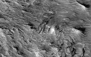 <h1>PIA00802:  Hebes Chasma #1</h1><div class="PIA00802" lang="en" style="width:450px;text-align:left;margin:auto;background-color:#000;padding:10px;max-height:150px;overflow:auto;">Complex variations in dune forms within Hebes Chasma. This northern subframe image, frame 3506, is a 2.3 x 3.6 km area centered near 0.6 degrees south, 76.3 degrees west.<p>Figure caption from Science Magazine<br /><br /><a href="http://photojournal.jpl.nasa.gov/catalog/PIA00802" onclick="window.open(this.href); return false;" title="Voir l'image 	 PIA00802:  Hebes Chasma #1	  sur le site de la NASA">Voir l'image 	 PIA00802:  Hebes Chasma #1	  sur le site de la NASA.</a></div>