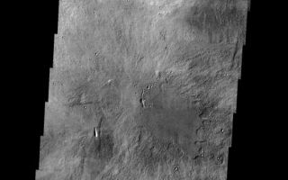 <h1>PIA03949:  Arsia Mons Caldera</h1><div class="PIA03949" lang="en" style="width:524px;text-align:left;margin:auto;background-color:#000;padding:10px;max-height:150px;overflow:auto;"><p>This VIS image shows part of the summit calera of Arsia Mons. There are numerous small volcanic constructs with lava flows in the image. The vents of these small volcanoes fall along the NE alignment of the large volcanoes.</p><p>Image information: VIS instrument. Latitude -9, Longitude 239.8 East (120.2 West). 17 meter/pixel resolution.</p><p>Note: this THEMIS visual image has not been radiometrically nor geometrically calibrated for this preliminary release. An empirical correction has been performed to remove instrumental effects. A linear shift has been applied in the cross-track and down-track direction to approximate spacecraft and planetary motion. Fully calibrated and geometrically projected images will be released through the Planetary Data System in accordance with Project policies at a later time.</p><p>NASA's Jet Propulsion Laboratory manages the 2001 Mars Odyssey mission for NASA's Office of Space Science, Washington, D.C. The Thermal Emission Imaging System (THEMIS) was developed by Arizona State University, Tempe, in collaboration with Raytheon Santa Barbara Remote Sensing. The THEMIS investigation is led by Dr. Philip Christensen at Arizona State University. Lockheed Martin Astronautics, Denver, is the prime contractor for the Odyssey project, and developed and built the orbiter. Mission operations are conducted jointly from Lockheed Martin and from JPL, a division of the California Institute of Technology in Pasadena.</p><br /><br /><a href="http://photojournal.jpl.nasa.gov/catalog/PIA03949" onclick="window.open(this.href); return false;" title="Voir l'image 	 PIA03949:  Arsia Mons Caldera	  sur le site de la NASA">Voir l'image 	 PIA03949:  Arsia Mons Caldera	  sur le site de la NASA.</a></div>