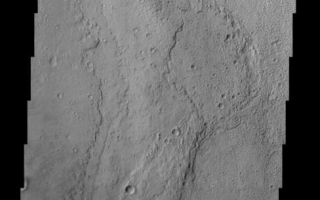 <h1>PIA04032:  Palos Crater</h1><div class="PIA04032" lang="en" style="width:488px;text-align:left;margin:auto;background-color:#000;padding:10px;max-height:150px;overflow:auto;"><p><a href="/figures/PIA04032_context.jpg"></a><br><p>Palos Crater has been suggested as a future landing site for Mars Missions. This crater has a channel called Tinto Vallis, which enters from the south. This site was suggested as a landing site because it may contain lake deposits. Palos Crater is named in honor of the port city in Spain from which Christopher Columbus sailed on his way to the New World in August of 1492. The floor of Palos Crater appears to be layered in places providing further evidence that this site may in fact have been the location of an ancient lake.<p>Note: this THEMIS visual image has not been radiometrically nor geometrically calibrated for this preliminary release. An empirical correction has been performed to remove instrumental effects. A linear shift has been applied in the cross-track and down-track direction to approximate spacecraft and planetary motion. Fully calibrated and geometrically projected images will be released through the Planetary Data System in accordance with Project policies at a later time.<p>NASA's Jet Propulsion Laboratory manages the 2001 Mars Odyssey mission for NASA's Office of Space Science, Washington, D.C. The Thermal Emission Imaging System (THEMIS) was developed by Arizona State University, Tempe, in collaboration with Raytheon Santa Barbara Remote Sensing. The THEMIS investigation is led by Dr. Philip Christensen at Arizona State University. Lockheed Martin Astronautics, Denver, is the prime contractor for the Odyssey project, and developed and built the orbiter. Mission operations are conducted jointly from Lockheed Martin and from JPL, a division of the California Institute of Technology in Pasadena.<p><br /><br /><a href="http://photojournal.jpl.nasa.gov/catalog/PIA04032" onclick="window.open(this.href); return false;" title="Voir l'image 	 PIA04032:  Palos Crater	  sur le site de la NASA">Voir l'image 	 PIA04032:  Palos Crater	  sur le site de la NASA.</a></div>