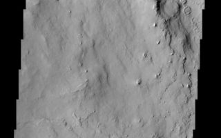 <h1>PIA04058:  Henry Crater</h1><div class="PIA04058" lang="en" style="width:489px;text-align:left;margin:auto;background-color:#000;padding:10px;max-height:150px;overflow:auto;"><p><a href="/figures/PIA04058_context.jpg"></a><br><p>Located in Arabia Terra, the crater shown here is known as Henry Crater. Like many other craters on Mars, the interior of Henry Crater is filled with a layered deposit. These materials were brought into the crater sometime after the impact formed the crater. The fine scale of layering can be seen in the right- center portion of the image.<p>Note: this THEMIS visual image has not been radiometrically nor geometrically calibrated for this preliminary release. An empirical correction has been performed to remove instrumental effects. A linear shift has been applied in the cross-track and down-track direction to approximate spacecraft and planetary motion. Fully calibrated and geometrically projected images will be released through the Planetary Data System in accordance with Project policies at a later time.<p>NASA's Jet Propulsion Laboratory manages the 2001 Mars Odyssey mission for NASA's Office of Space Science, Washington, D.C. The Thermal Emission Imaging System (THEMIS) was developed by Arizona State University, Tempe, in collaboration with Raytheon Santa Barbara Remote Sensing. The THEMIS investigation is led by Dr. Philip Christensen at Arizona State University. Lockheed Martin Astronautics, Denver, is the prime contractor for the Odyssey project, and developed and built the orbiter. Mission operations are conducted jointly from Lockheed Martin and from JPL, a division of the California Institute of Technology in Pasadena.<p><br /><br /><a href="http://photojournal.jpl.nasa.gov/catalog/PIA04058" onclick="window.open(this.href); return false;" title="Voir l'image 	 PIA04058:  Henry Crater	  sur le site de la NASA">Voir l'image 	 PIA04058:  Henry Crater	  sur le site de la NASA.</a></div>