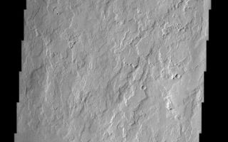 <h1>PIA04063:  Olympus Mons Flows</h1><div class="PIA04063" lang="en" style="width:489px;text-align:left;margin:auto;background-color:#000;padding:10px;max-height:150px;overflow:auto;"><p><a href="/figures/PIA04063_context.jpg"></a><br><p>Like drippings from a candle, these lava flows on the flank of Olympus Mons volcano demonstrate how it became the largest volcano in the solar system. Multiple flows from an unknowable number of eruptions have piled one on top of another until the mountain of lava reached a height of 27 km above the average Martian elevation. The change in texture seen in the bottom 1/3 of the image marks a break in slope from the flank of the volcano to the north (top) and the flat plain surrounding it. The direction of flows changes from roughly N-S to E-W, suggesting another source for the flows on the plain.<p>Note: this THEMIS visual image has not been radiometrically nor geometrically calibrated for this preliminary release. An empirical correction has been performed to remove instrumental effects. A linear shift has been applied in the cross-track and down-track direction to approximate spacecraft and planetary motion. Fully calibrated and geometrically projected images will be released through the Planetary Data System in accordance with Project policies at a later time.<p>NASA's Jet Propulsion Laboratory manages the 2001 Mars Odyssey mission for NASA's Office of Space Science, Washington, D.C. The Thermal Emission Imaging System (THEMIS) was developed by Arizona State University, Tempe, in collaboration with Raytheon Santa Barbara Remote Sensing. The THEMIS investigation is led by Dr. Philip Christensen at Arizona State University. Lockheed Martin Astronautics, Denver, is the prime contractor for the Odyssey project, and developed and built the orbiter. Mission operations are conducted jointly from Lockheed Martin and from JPL, a division of the California Institute of Technology in Pasadena.<p><br /><br /><a href="http://photojournal.jpl.nasa.gov/catalog/PIA04063" onclick="window.open(this.href); return false;" title="Voir l'image 	 PIA04063:  Olympus Mons Flows	  sur le site de la NASA">Voir l'image 	 PIA04063:  Olympus Mons Flows	  sur le site de la NASA.</a></div>