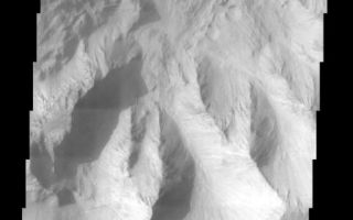 <h1>PIA04068:  Coprates Chasma Landslide</h1><div class="PIA04068" lang="en" style="width:482px;text-align:left;margin:auto;background-color:#000;padding:10px;max-height:150px;overflow:auto;"><p><a href="/figures/PIA04068_context.jpg"></a><br><p>Coprates Chasma comprises the central portion of the Valles Marineris canyon system complex. This image of the southern wall of Coprates Chasma contains a landslide deposit with dunes over portions of slide. Landslides have very characteristic morphologies on Earth, which they also display on Mars. These morphologies include a distinctive escarpment at the uppermost part of the landslide--called a head scarp (seen at the bottom of this image), a down-dropped block of material below that escarpment that dropped almost vertically, and a deposit of debris that moved away from the escarpment at high speed. In this example, the wall rock displayed in the upper part of the cliff contains spurs and chutes created by differing amounts of erosion. The actual landslide deposit is delineated by its fan-shape and lobate margins. The dunes subsequently marched upon the landslide deposit.<p>Note: this THEMIS visual image has not been radiometrically nor geometrically calibrated for this preliminary release. An empirical correction has been performed to remove instrumental effects. A linear shift has been applied in the cross-track and down-track direction to approximate spacecraft and planetary motion. Fully calibrated and geometrically projected images will be released through the Planetary Data System in accordance with Project policies at a later time.<p>NASA's Jet Propulsion Laboratory manages the 2001 Mars Odyssey mission for NASA's Office of Space Science, Washington, D.C. The Thermal Emission Imaging System (THEMIS) was developed by Arizona State University, Tempe, in collaboration with Raytheon Santa Barbara Remote Sensing. The THEMIS investigation is led by Dr. Philip Christensen at Arizona State University. Lockheed Martin Astronautics, Denver, is the prime contractor for the Odyssey project, and developed and built the orbiter. Mission operations are conducted jointly from Lockheed Martin and from JPL, a division of the California Institute of Technology in Pasadena.<p><br /><br /><a href="http://photojournal.jpl.nasa.gov/catalog/PIA04068" onclick="window.open(this.href); return false;" title="Voir l'image 	 PIA04068:  Coprates Chasma Landslide	  sur le site de la NASA">Voir l'image 	 PIA04068:  Coprates Chasma Landslide	  sur le site de la NASA.</a></div>