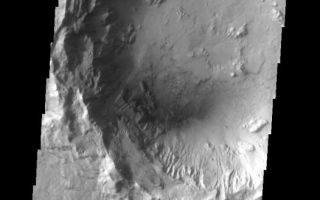 <h1>PIA04111:  Crater Interior with Internal Craters</h1><div class="PIA04111" lang="en" style="width:526px;text-align:left;margin:auto;background-color:#000;padding:10px;max-height:150px;overflow:auto;"><a href="/figures/PIA04111_fig1.jpg"></a><br /></p><p>Today's crater interior contains smaller craters, sand dunes, and erosional features caused the wind. Additionally, the crater rim appears subdued, likely due to dust cover. Note how the ejecta surrounding the small craters has be eroded by the wind.</p><p>Image information: VIS  instrument. Latitude 9, Longitude 358 East (2 West). 18 meter/pixel resolution.</p><p>Note: this THEMIS visual image has not been radiometrically nor geometrically calibrated for this preliminary release. An empirical correction has been performed to remove instrumental effects. A linear shift has been applied in the cross-track and down-track direction to approximate spacecraft and planetary motion. Fully calibrated and geometrically projected images will be released through the Planetary Data System in accordance with Project policies at a later time.</p><p>NASA's Jet Propulsion Laboratory manages the 2001 Mars Odyssey mission for NASA's Office of Space Science, Washington, D.C. The Thermal Emission Imaging System (THEMIS) was developed by Arizona State University, Tempe, in collaboration with Raytheon Santa Barbara Remote Sensing. The THEMIS investigation is led by Dr. Philip Christensen at Arizona State University. Lockheed Martin Astronautics, Denver, is the prime contractor for the Odyssey project, and developed and built the orbiter. Mission operations are conducted jointly from Lockheed Martin and from JPL, a division of the California Institute of Technology in Pasadena.</p><br /><br /><a href="http://photojournal.jpl.nasa.gov/catalog/PIA04111" onclick="window.open(this.href); return false;" title="Voir l'image 	 PIA04111:  Crater Interior with Internal Craters	  sur le site de la NASA">Voir l'image 	 PIA04111:  Crater Interior with Internal Craters	  sur le site de la NASA.</a></div>