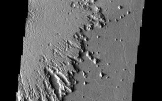 <h1>PIA04126:  Radial Erosion</h1><div class="PIA04126" lang="en" style="width:536px;text-align:left;margin:auto;background-color:#000;padding:10px;max-height:150px;overflow:auto;"><a href="/figures/PIA04126_fig1.jpg"></a><br /></p><p>The ejecta surrounding the crater (off image to the left) in this image has undergone significant erosion by the wind. The wind has stripped the surface features from the ejecta and has started to winnow away the ejecta blanket. Near the margin of the ejecta the wind is eroding along a radial pattern -- taking advantage of radial emplacement. Note the steep margin of the ejecta blanket. Most, if not all, of the fine ejecta material has been removed and the wind in now working on the more massive continuous ejecta blanket.</p><p>Image information: VIS  instrument. Latitude 12.5, Longitude 197.4 East (162.6 West). 37 meter/pixel resolution.</p><p>Note: this THEMIS visual image has not been radiometrically nor geometrically calibrated for this preliminary release. An empirical correction has been performed to remove instrumental effects. A linear shift has been applied in the cross-track and down-track direction to approximate spacecraft and planetary motion. Fully calibrated and geometrically projected images will be released through the Planetary Data System in accordance with Project policies at a later time.</p><p>NASA's Jet Propulsion Laboratory manages the 2001 Mars Odyssey mission for NASA's Office of Space Science, Washington, D.C. The Thermal Emission Imaging System (THEMIS) was developed by Arizona State University, Tempe, in collaboration with Raytheon Santa Barbara Remote Sensing. The THEMIS investigation is led by Dr. Philip Christensen at Arizona State University. Lockheed Martin Astronautics, Denver, is the prime contractor for the Odyssey project, and developed and built the orbiter. Mission operations are conducted jointly from Lockheed Martin and from JPL, a division of the California Institute of Technology in Pasadena.</p><br /><br /><a href="http://photojournal.jpl.nasa.gov/catalog/PIA04126" onclick="window.open(this.href); return false;" title="Voir l'image 	 PIA04126:  Radial Erosion	  sur le site de la NASA">Voir l'image 	 PIA04126:  Radial Erosion	  sur le site de la NASA.</a></div>