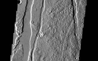 <h1>PIA04504:  Craters, Pit Chains, and Graben, Oh My!</h1><div class="PIA04504" lang="en" style="width:542px;text-align:left;margin:auto;background-color:#000;padding:10px;max-height:150px;overflow:auto;"><p><a href="/figures/PIA04504_context.jpg"></a><br><p>Released 6 May 2003<p>Craters, pit chains, graben, and lava flows south of Alba Patera, a volcano located within the Tharsis volcanic complex.<p>Image information: VIS instrument. Latitude 27.1, Longitude 245 East (115 West). 19 meter/pixel resolution.<p>Note: this THEMIS visual image has not been radiometrically nor geometrically calibrated for this preliminary release. An empirical correction has been performed to remove instrumental effects. A linear shift has been applied in the cross-track and down-track direction to approximate spacecraft and planetary motion. Fully calibrated and geometrically projected images will be released through the Planetary Data System in accordance with Project policies at a later time.<p>NASA's Jet Propulsion Laboratory manages the 2001 Mars Odyssey mission for NASA's Office of Space Science, Washington, D.C. The Thermal Emission Imaging System (THEMIS) was developed by Arizona State University, Tempe, in collaboration with Raytheon Santa Barbara Remote Sensing. The THEMIS investigation is led by Dr. Philip Christensen at Arizona State University. Lockheed Martin Astronautics, Denver, is the prime contractor for the Odyssey project, and developed and built the orbiter. Mission operations are conducted jointly from Lockheed Martin and from JPL, a division of the California Institute of Technology in Pasadena.<p><br /><br /><a href="http://photojournal.jpl.nasa.gov/catalog/PIA04504" onclick="window.open(this.href); return false;" title="Voir l'image 	 PIA04504:  Craters, Pit Chains, and Graben, Oh My!	  sur le site de la NASA">Voir l'image 	 PIA04504:  Craters, Pit Chains, and Graben, Oh My!	  sur le site de la NASA.</a></div>