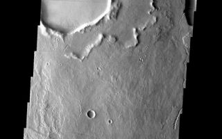 <h1>PIA04522:  Unusual Crater</h1><div class="PIA04522" lang="en" style="width:534px;text-align:left;margin:auto;background-color:#000;padding:10px;max-height:150px;overflow:auto;"><p><a href="/figures/PIA04522_context.jpg"></a><br><p>Released 15 May 2003<p>This unusual crater northeast of Ascraeus Mons displays an ejecta blanket that appears turned up around its edges. This may be a type of rampart crater, or may instead be a crater with its ejecta blanket buried by lava flows. These flows were later eroded away in places leaving behind the scarp. Numerous lava flows are seen in this image as well as sinuous channels. These features appear to be both volcanic (rilles) and fluvial channels.<p>Image information: VIS instrument. Latitude 16.8, Longitude 257.4East (102.6). 19 meter/pixel resolution.<p>Note: this THEMIS visual image has not been radiometrically nor geometrically calibrated for this preliminary release. An empirical correction has been performed to remove instrumental effects. A linear shift has been applied in the cross-track and down-track direction to approximate spacecraft and planetary motion. Fully calibrated and geometrically projected images will be released through the Planetary Data System in accordance with Project policies at a later time.<p>NASA's Jet Propulsion Laboratory manages the 2001 Mars Odyssey mission for NASA's Office of Space Science, Washington, D.C. The Thermal Emission Imaging System (THEMIS) was developed by Arizona State University, Tempe, in collaboration with Raytheon Santa Barbara Remote Sensing. The THEMIS investigation is led by Dr. Philip Christensen at Arizona State University. Lockheed Martin Astronautics, Denver, is the prime contractor for the Odyssey project, and developed and built the orbiter. Mission operations are conducted jointly from Lockheed Martin and from JPL, a division of the California Institute of Technology in Pasadena.<p><br /><br /><a href="http://photojournal.jpl.nasa.gov/catalog/PIA04522" onclick="window.open(this.href); return false;" title="Voir l'image 	 PIA04522:  Unusual Crater	  sur le site de la NASA">Voir l'image 	 PIA04522:  Unusual Crater	  sur le site de la NASA.</a></div>