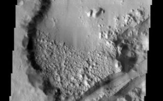 <h1>PIA04763:  A Crater Split In Two</h1><div class="PIA04763" lang="en" style="width:473px;text-align:left;margin:auto;background-color:#000;padding:10px;max-height:150px;overflow:auto;"><p /><a href="/figures/PIA04763_context.jpg"></a><br /><p />Released 23 September 2003<p />A 22 km-diameter crater has been sliced by the tectonic forces that produced the rift known as Sirenum Fossae. The orientation of this rift is roughly radial to the great Tharsis volcano Arsia Mons, probably indicating a link between the formation of the rift and the volcano. Note how the rift cuts through a jumble of mounds on the floor of the crater. This indicates a sequence of events beginning with the formation of the crater followed by an infilling of material that was then eroded into the mounds and ultimately split open by the shifting martian crust.<p />Image information: VIS instrument. Latitude -29.7, Longitude 211.7 East (148.3 West). 19 meter/pixel resolution.<p />Note: this THEMIS visual image has not been radiometrically nor geometrically calibrated for this preliminary release. An empirical correction has been performed to remove instrumental effects. A linear shift has been applied in the cross-track and down-track direction to approximate spacecraft and planetary motion. Fully calibrated and geometrically projected images will be released through the Planetary Data System in accordance with Project policies at a later time. <p />NASA's Jet Propulsion Laboratory manages the 2001 Mars Odyssey mission for NASA's Office of Space Science, Washington, D.C. The Thermal Emission Imaging System (THEMIS) was developed by Arizona State University, Tempe, in collaboration with Raytheon Santa Barbara Remote Sensing. The THEMIS investigation is led by Dr. Philip Christensen at Arizona State University. Lockheed Martin Astronautics, Denver, is the prime contractor for the Odyssey project, and developed and built the orbiter. Mission operations are conducted jointly from Lockheed Martin and from JPL, a division of the California Institute of Technology in Pasadena.<br /><br /><a href="http://photojournal.jpl.nasa.gov/catalog/PIA04763" onclick="window.open(this.href); return false;" title="Voir l'image 	 PIA04763:  A Crater Split In Two	  sur le site de la NASA">Voir l'image 	 PIA04763:  A Crater Split In Two	  sur le site de la NASA.</a></div>