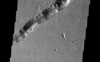 <h1>PIA07053:  Tharsis Collapse Pits</h1><div class="PIA07053" lang="en" style="width:526px;text-align:left;margin:auto;background-color:#000;padding:10px;max-height:150px;overflow:auto;"><p><a href="/figures/PIA07053_fig1.jpg"> </a><br /><p>We will be looking at collapse pits for the next two weeks. Collapse pits on Mars are formed in several ways. In volcanic areas, channelized lava flows can form roofs which insulate the flowing lava. These features are termed lava tubes on Earth and are common features in basaltic flows. After the lava has drained, parts of the roof of the tube will collapse under its own weight. These collapse pits will only be as deep as the bottom of the original lava tube. Another type of collapse feature associated with volcanic areas arises when very large eruptions completely evacuate the magma chamber beneath the volcano. The weight of the volcano will cause the entire edifice to subside into the void space below it. Structural features including fractures and graben will form during the subsidence. Many times collapse pits will form within the graben. In addition to volcanic collapse pits, Mars has many collapse pits formed when volatiles (such as subsurface ice) are released from the surface layers. As the volatiles leave, the weight of the surrounding rock causes collapse pits to form.</p><p>These collapse pits are found within the extensive lava flows of the Tharsis region. They are related to lava tubes, likely coming from Ascraeus Mons.</p><p>Image information: VIS instrument. Latitude 22.8, Longitude 266.8 East (93.2 West). 19 meter/pixel resolution.</p><p>Note: this THEMIS visual image has not been radiometrically nor geometrically calibrated for this preliminary release. An empirical correction has been performed to remove instrumental effects. A linear shift has been applied in the cross-track and down-track direction to approximate spacecraft and planetary motion. Fully calibrated and geometrically projected images will be released through the Planetary Data System in accordance with Project policies at a later time.</p><p>NASA's Jet Propulsion Laboratory manages the 2001 Mars Odyssey mission for NASA's Office of Space Science, Washington, D.C. The Thermal Emission Imaging System (THEMIS) was developed by Arizona State University, Tempe, in collaboration with Raytheon Santa Barbara Remote Sensing. The THEMIS investigation is led by Dr. Philip Christensen at Arizona State University. Lockheed Martin Astronautics, Denver, is the prime contractor for the Odyssey project, and developed and built the orbiter. Mission operations are conducted jointly from Lockheed Martin and from JPL, a division of the California Institute of Technology in Pasadena.</p><br /><br /><a href="http://photojournal.jpl.nasa.gov/catalog/PIA07053" onclick="window.open(this.href); return false;" title="Voir l'image 	 PIA07053:  Tharsis Collapse Pits	  sur le site de la NASA">Voir l'image 	 PIA07053:  Tharsis Collapse Pits	  sur le site de la NASA.</a></div>