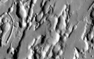 <h1>PIA07068:  Arsia Mons Collapse Pits in IR</h1><div class="PIA07068" lang="en" style="width:319px;text-align:left;margin:auto;background-color:#000;padding:10px;max-height:150px;overflow:auto;"><p><a href="/figures/PIA07068_fig1.jpg"> </a><br /><p>We will be looking at collapse pits for the next two weeks. Collapse pits on Mars are formed in several ways. In volcanic areas, channelized lava flows can form roofs which insulate the flowing lava. These features are termed lava tubes on Earth and are common features in basaltic flows. After the lava has drained, parts of the roof of the tube will collapse under its own weight. These collapse pits will only be as deep as the bottom of the original lava tube. Another type of collapse feature associated with volcanic areas arises when very large eruptions completely evacuate the magma chamber beneath the volcano. The weight of the volcano will cause the entire edifice to subside into the void space below it. Structural features including fractures and graben will form during the subsidence. Many times collapse pits will form within the graben. In addition to volcanic collapse pits, Mars has many collapse pits formed when volatiles (such as subsurface ice) are released from the surface layers. As the volatiles leave, the weight of the surrounding rock causes collapse pits to form.</p><p>These collapse pits are found on the flank of Arsia Mons and are related to lava tube collapse.</p><p>Image information: IR instrument. Latitude -8.8, Longitude 240.4 East (119.6 West). 100 meter/pixel resolution.</p><p>Note: this THEMIS visual image has not been radiometrically nor geometrically calibrated for this preliminary release. An empirical correction has been performed to remove instrumental effects. A linear shift has been applied in the cross-track and down-track direction to approximate spacecraft and planetary motion. Fully calibrated and geometrically projected images will be released through the Planetary Data System in accordance with Project policies at a later time.</p><p>NASA's Jet Propulsion Laboratory manages the 2001 Mars Odyssey mission for NASA's Office of Space Science, Washington, D.C. The Thermal Emission Imaging System (THEMIS) was developed by Arizona State University, Tempe, in collaboration with Raytheon Santa Barbara Remote Sensing. The THEMIS investigation is led by Dr. Philip Christensen at Arizona State University. Lockheed Martin Astronautics, Denver, is the prime contractor for the Odyssey project, and developed and built the orbiter. Mission operations are conducted jointly from Lockheed Martin and from JPL, a division of the California Institute of Technology in Pasadena.</p><br /><br /><a href="http://photojournal.jpl.nasa.gov/catalog/PIA07068" onclick="window.open(this.href); return false;" title="Voir l'image 	 PIA07068:  Arsia Mons Collapse Pits in IR	  sur le site de la NASA">Voir l'image 	 PIA07068:  Arsia Mons Collapse Pits in IR	  sur le site de la NASA.</a></div>