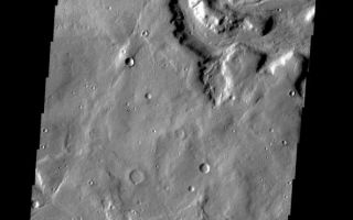 <h1>PIA09040:  Channel & Crater</h1><div class="PIA09040" lang="en" style="width:592px;text-align:left;margin:auto;background-color:#000;padding:10px;max-height:150px;overflow:auto;"><p><a href="/figures/PIA09040_fig1.jpg"></a><br><b>Context image for PIA09040<br />Channel & Crater</b></p><p>This unnamed crater near Timoshenko Crater has been breached by a channel.<p>Image information: VIS instrument. Latitude 43.6N, Longitude 296.4E. 19 meter/pixel resolution.</p><p>Please see the <a href="http://themis.asu.edu/terms" target="_blank">THEMIS Data Citation Note</a> for details on crediting THEMIS images.</p><p>Note: this THEMIS visual image has not been radiometrically nor geometrically calibrated for this preliminary release. An empirical correction has been performed to remove instrumental effects. A linear shift has been applied in the cross-track and down-track direction to approximate spacecraft and planetary motion. Fully calibrated and geometrically projected images will be released through the Planetary Data System in accordance with Project policies at a later time.</p><p>NASA's Jet Propulsion Laboratory manages the 2001 Mars Odyssey mission for NASA's Office of Space Science, Washington, D.C. The Thermal Emission Imaging System (THEMIS) was developed by Arizona State University, Tempe, in collaboration with Raytheon Santa Barbara Remote Sensing. The THEMIS investigation is led by Dr. Philip Christensen at Arizona State University. Lockheed Martin Astronautics, Denver, is the prime contractor for the Odyssey project, and developed and built the orbiter. Mission operations are conducted jointly from Lockheed Martin and from JPL, a division of the California Institute of Technology in Pasadena.</p><br /><br /><a href="http://photojournal.jpl.nasa.gov/catalog/PIA09040" onclick="window.open(this.href); return false;" title="Voir l'image 	 PIA09040:  Channel & Crater	  sur le site de la NASA">Voir l'image 	 PIA09040:  Channel & Crater	  sur le site de la NASA.</a></div>