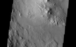 <h1>PIA10065:  Landslide</h1><div class="PIA10065" lang="en" style="width:563px;text-align:left;margin:auto;background-color:#000;padding:10px;max-height:150px;overflow:auto;"><p><a href="/figures/PIA10065_fig1.jpg"></a><br><b>Context image for PIA10065<br />Landslide</b></p><p>This landslide is lacated within an unnamed crater in Terra Cimmeria.<p>Image information: VIS instrument. Latitude -28.8N, Longitude 136.9E. 17 meter/pixel resolution.</p><p>Please see the <a href="http://themis.asu.edu/terms" target="_blank">THEMIS Data Citation Note</a> for details on crediting THEMIS images.</p><p>Note: this THEMIS visual image has not been radiometrically nor geometrically calibrated for this preliminary release. An empirical correction has been performed to remove instrumental effects. A linear shift has been applied in the cross-track and down-track direction to approximate spacecraft and planetary motion. Fully calibrated and geometrically projected images will be released through the Planetary Data System in accordance with Project policies at a later time.</p><p>NASA's Jet Propulsion Laboratory manages the 2001 Mars Odyssey mission for NASA's Office of Space Science, Washington, D.C. The Thermal Emission Imaging System (THEMIS) was developed by Arizona State University, Tempe, in collaboration with Raytheon Santa Barbara Remote Sensing. The THEMIS investigation is led by Dr. Philip Christensen at Arizona State University. Lockheed Martin Astronautics, Denver, is the prime contractor for the Odyssey project, and developed and built the orbiter. Mission operations are conducted jointly from Lockheed Martin and from JPL, a division of the California Institute of Technology in Pasadena.</p><br /><br /><a href="http://photojournal.jpl.nasa.gov/catalog/PIA10065" onclick="window.open(this.href); return false;" title="Voir l'image 	 PIA10065:  Landslide	  sur le site de la NASA">Voir l'image 	 PIA10065:  Landslide	  sur le site de la NASA.</a></div>